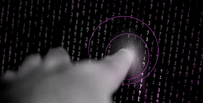 Eine männliche Hand tippt auf einen Bildschirm mit Schriftzeichen.